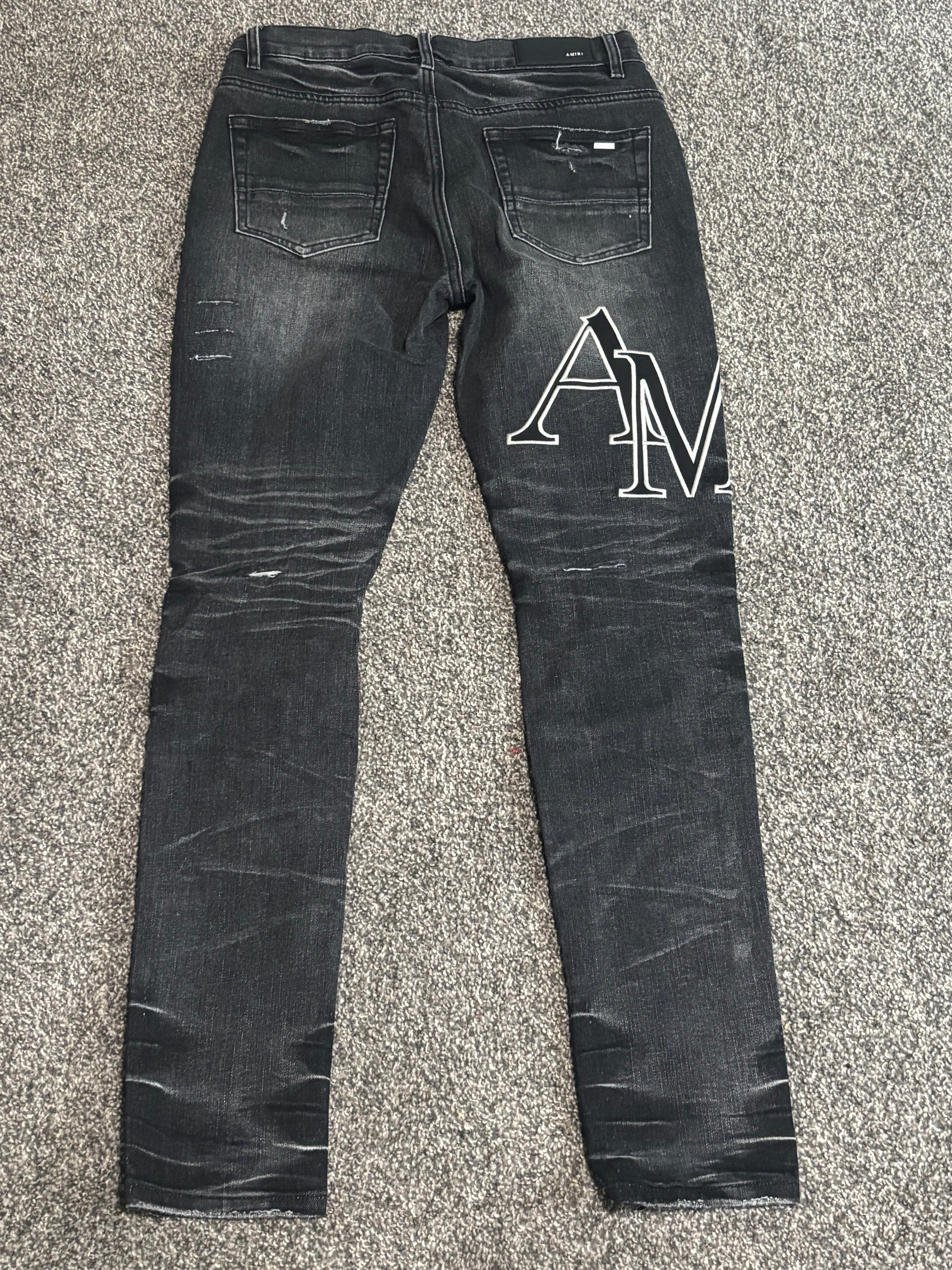 BLACK AND WHITE WASHED AMIRI JEAN
