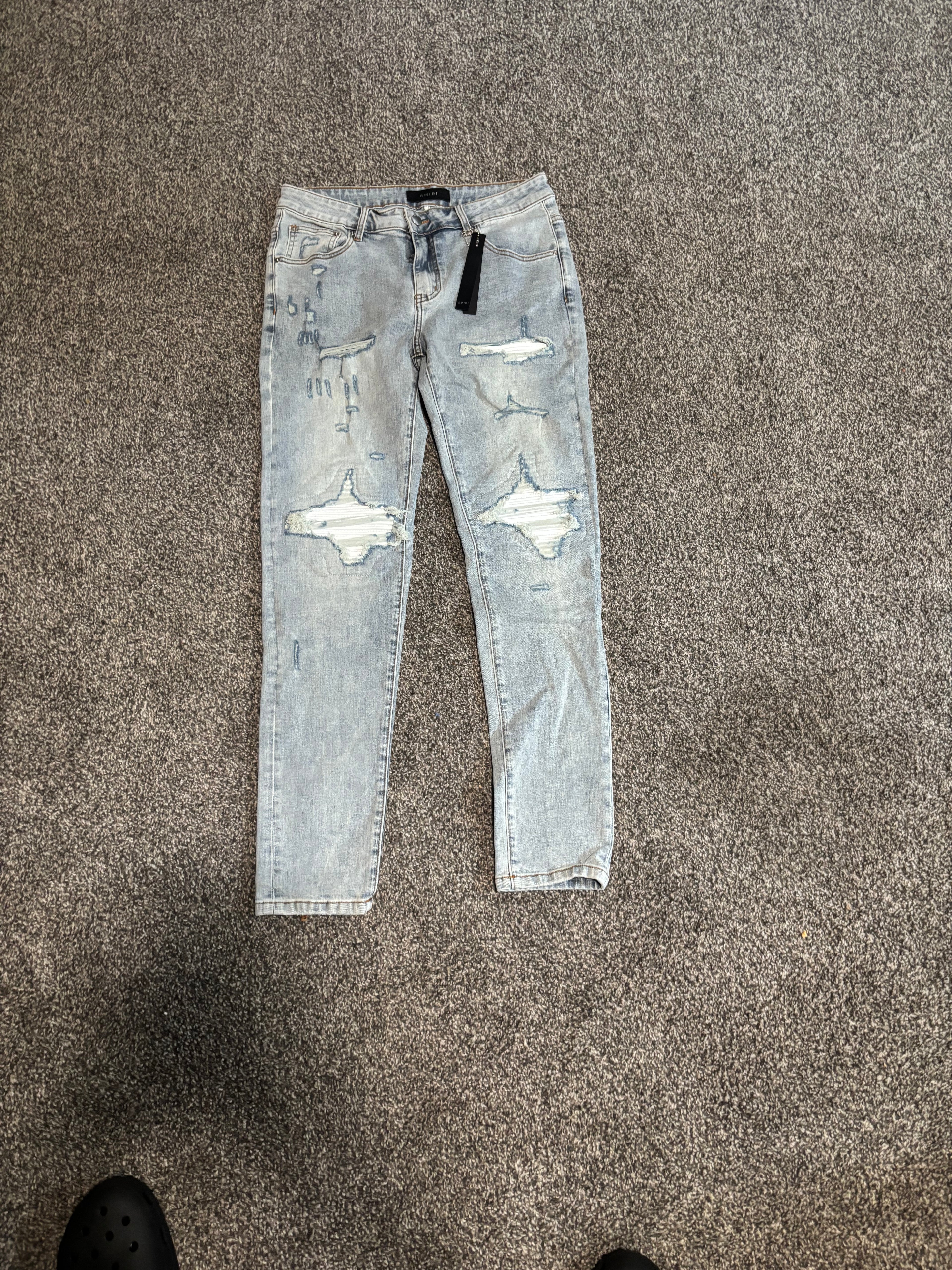 LIGHT BLUE WASHED AMIRI JEAN